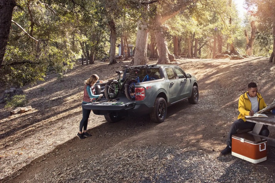A 2022 Ford Maverick is a camping-ready little truck.  How small is the compact truck compared to models like the Toyota Tacoma and Hyundai Santa Cruz?