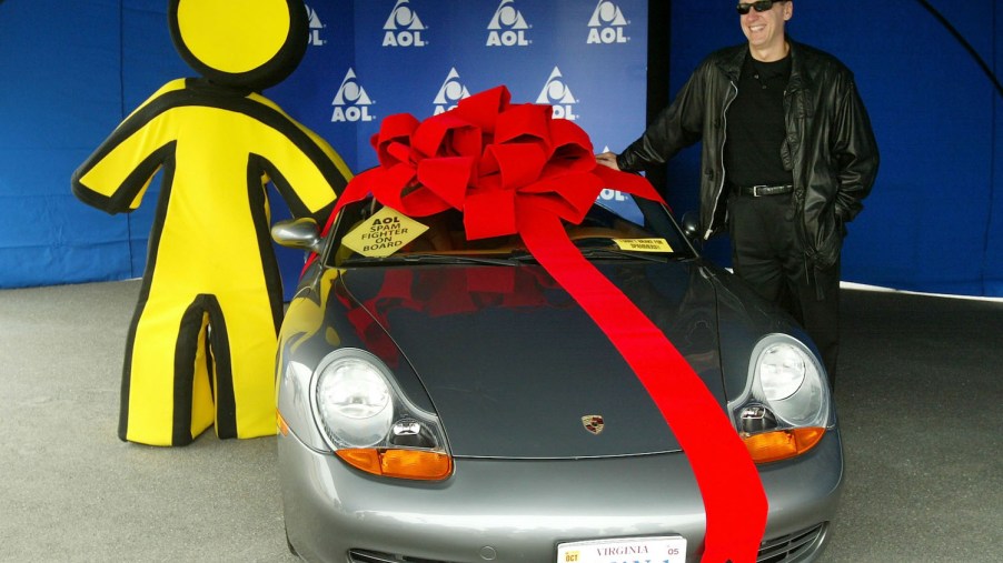 AOL CEO hosting a give-away of a Porsche sports car.
