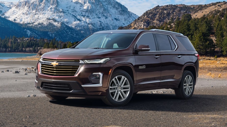 Front angle view of the brown 2023 Chevy Traverse, highlighting its release date and price