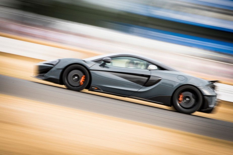 A McLaren speeds up the hill at the Goodwood Festival of Speed