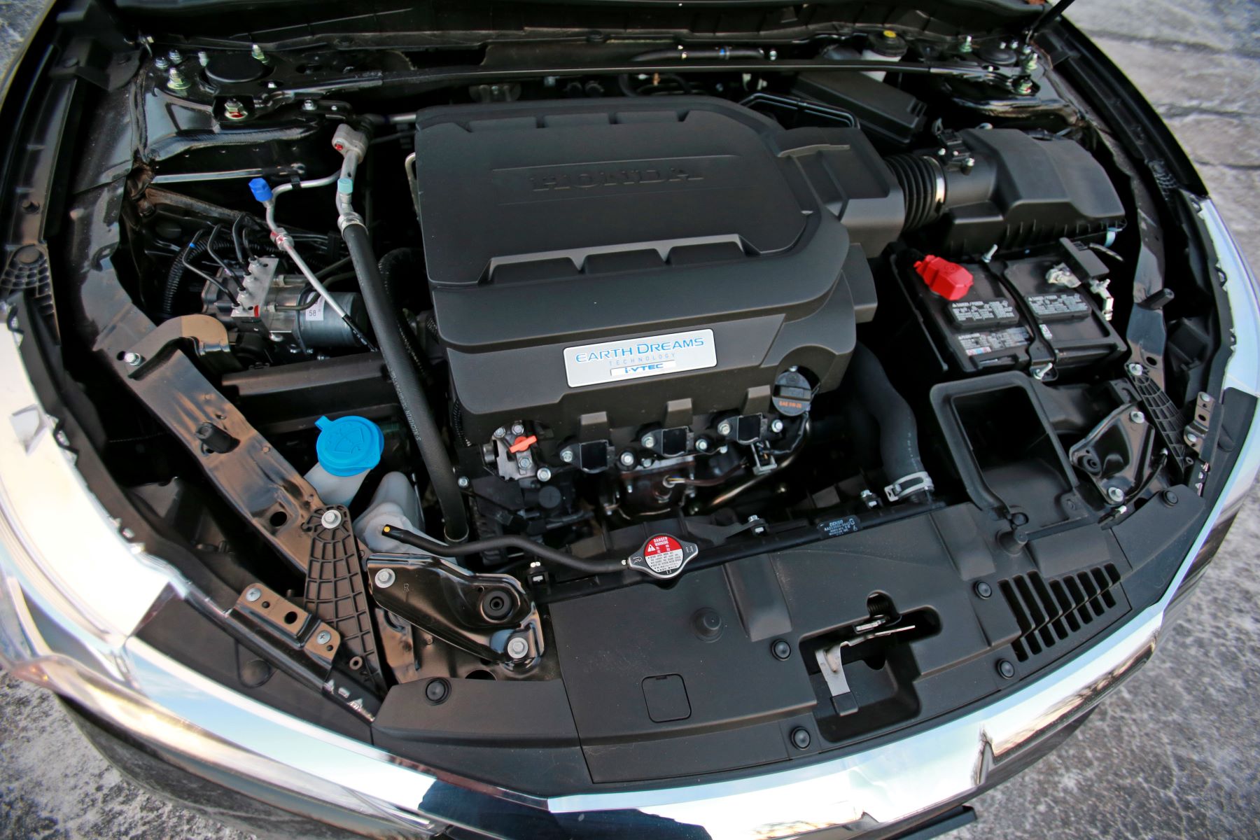 A V6 engine under the hood of a 2016 Honda Accord EX-L midsize sedan model