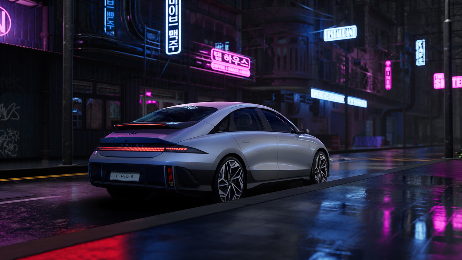 rear view of the all-new Hyundai Ioniq 6 EV parked on city street