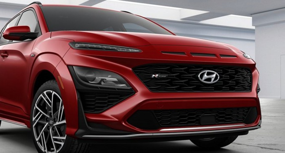 A red 2022 Hyundai Kona N Line is parked. 