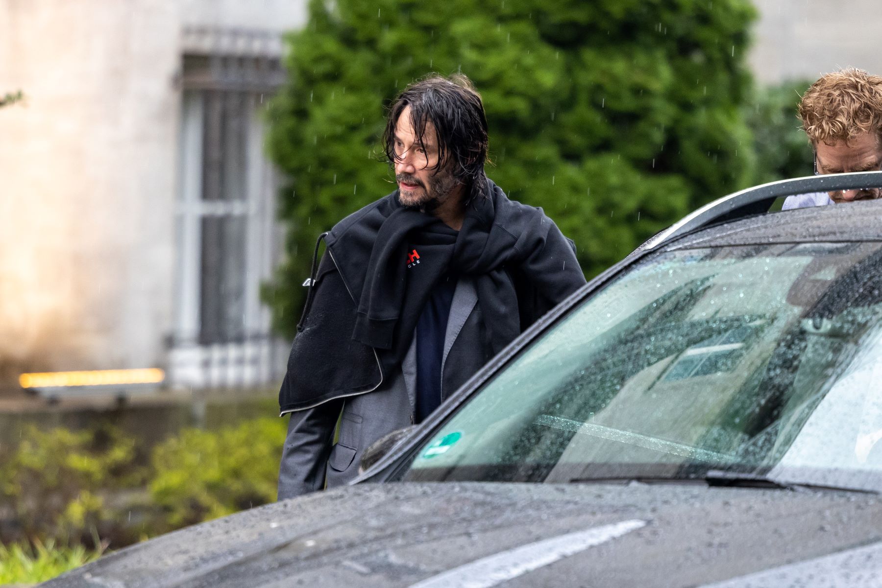 Keanu Reeves leaving his hotel by car to shoot 'John Wick: Chapter 4' in Berlin, Germany