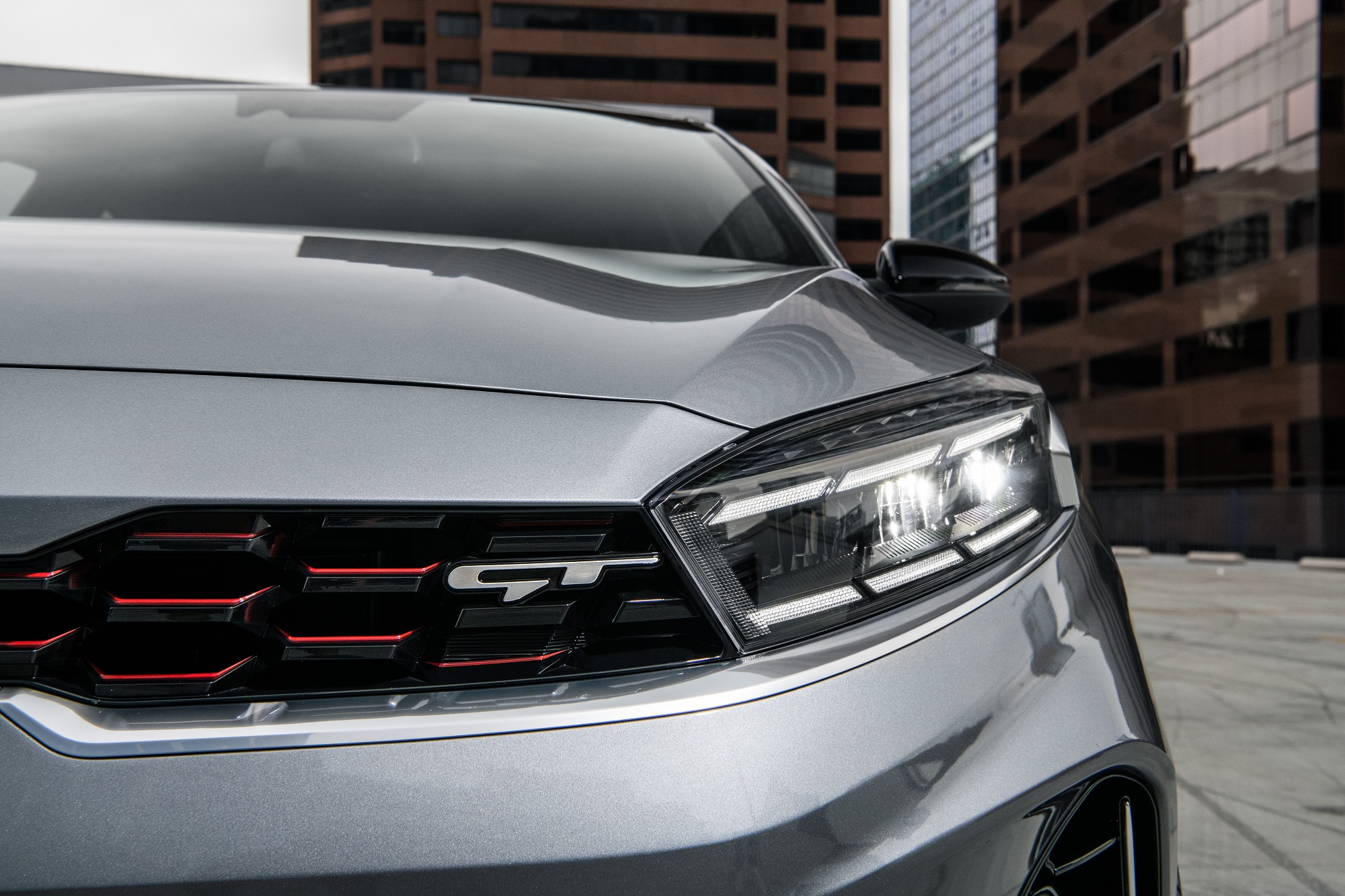 The 2022 Kia Forte, like the gray GT pictured here, is a competitor for the 2022 Honda Civic