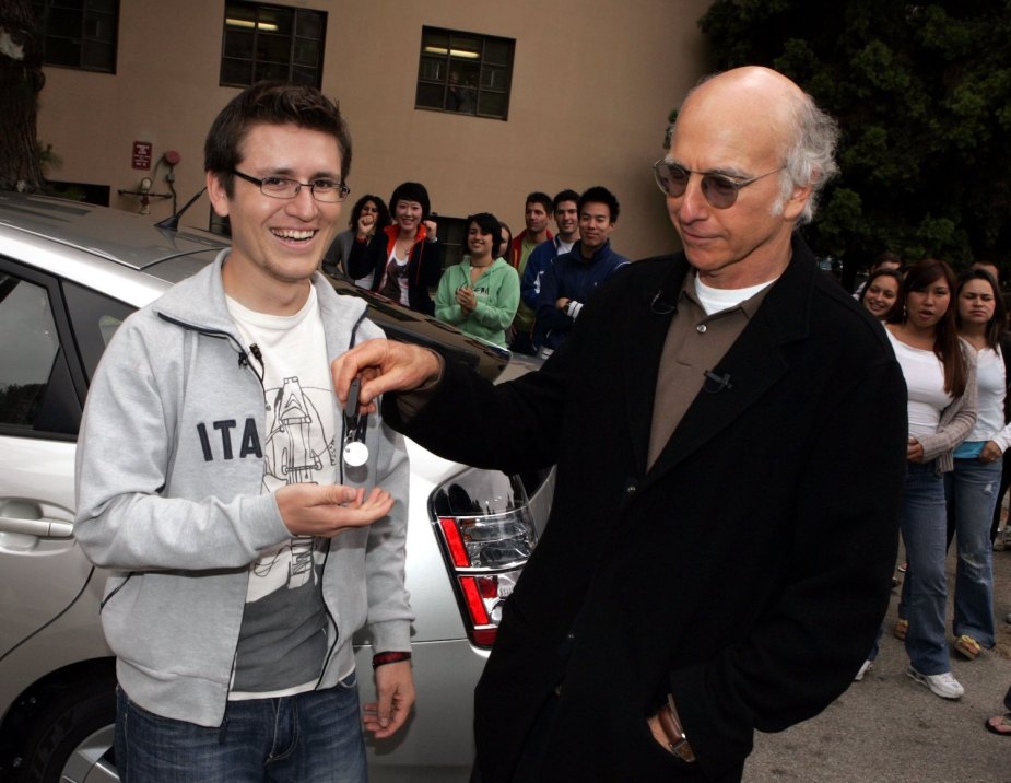 TV star Larry David giving away a Toyota Prius during a contest.