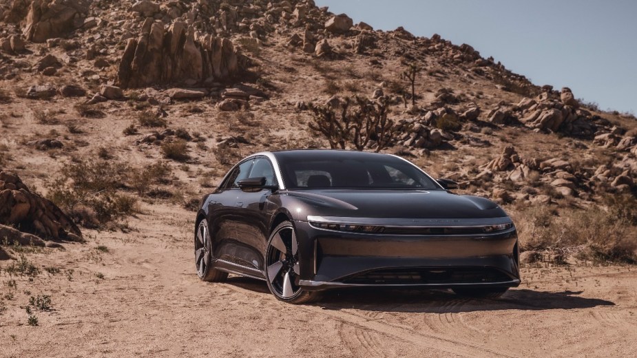 lucid air parked in the desert, a luxury focused electric vehicle