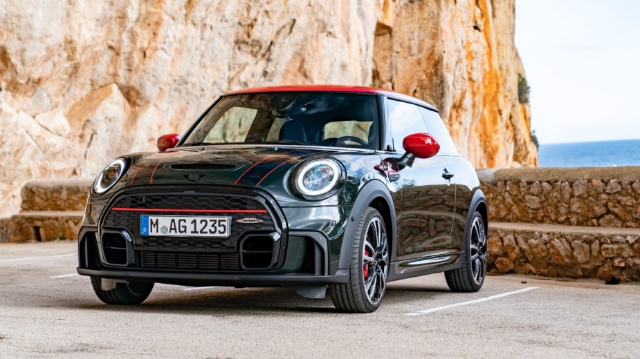 a new mini john cooper works hardtop parked over looking the ocean
