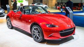 Mazda MX-5 Miata in red, which is the one sports car comes with a fuel economy over 30 mpg.