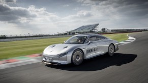 The silver Mercedes-Benz Vision EQXX Concept running laps on a racetrack