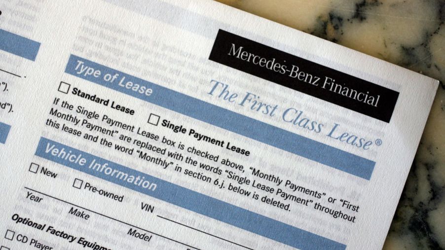A Mercedes-Benz car lease agreement at the Herb Chambers Mercedes dealership in Somerville, Massachusetts