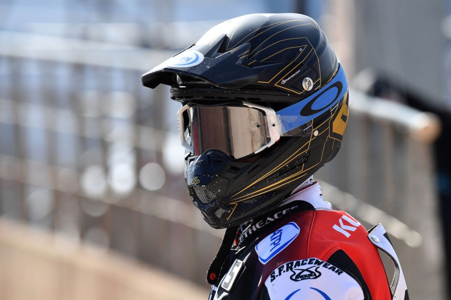 A motorcycle helmet fit to a motorcycle racer.