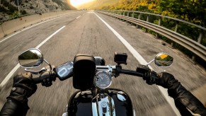 A person riding a motorcycle.