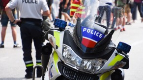 A police motorcycle parked outdoors.