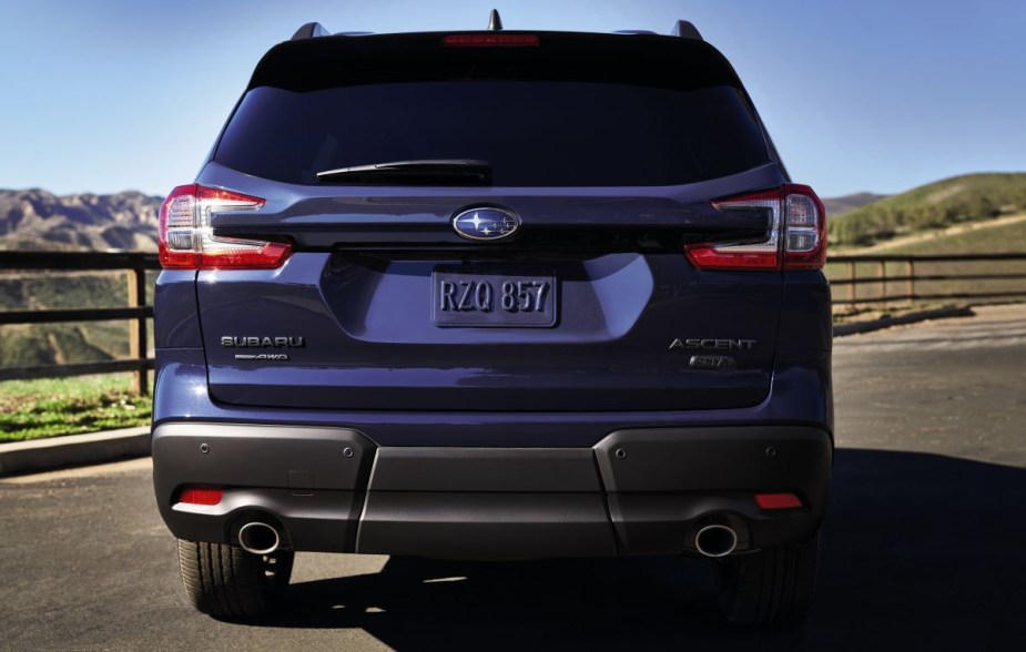 Rear view of purple 2023 Subaru Ascent, highlighting its release date and price