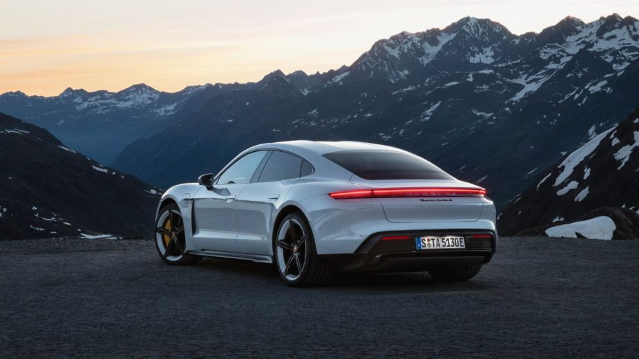 Previous look at the white 2023 Porsche Taycan, highlighting its release date and price