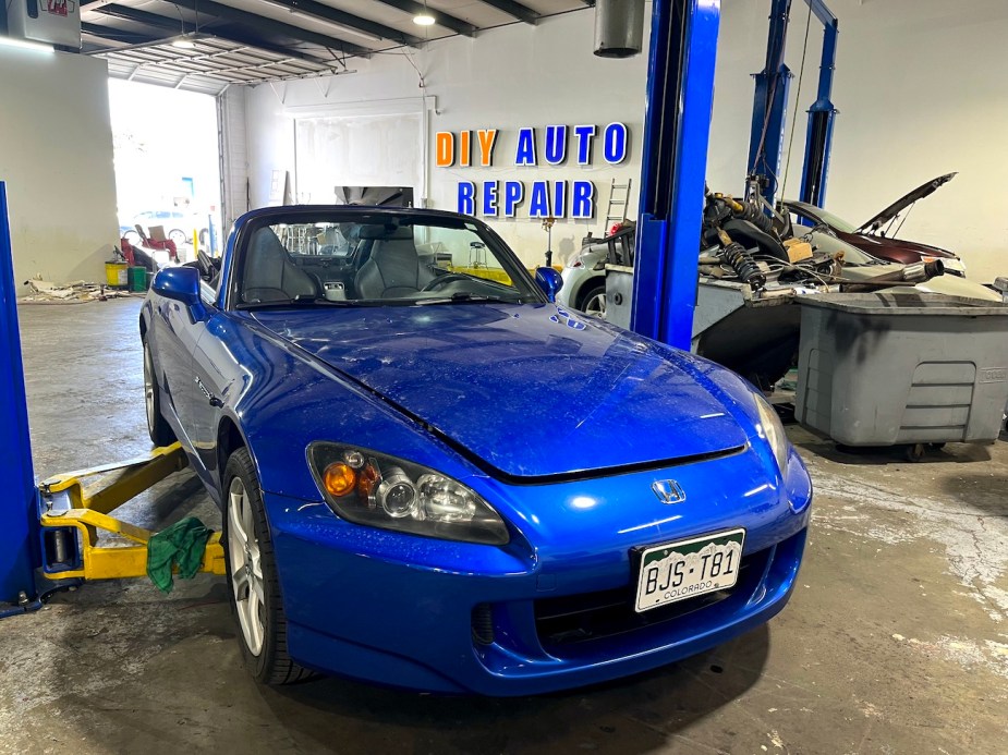 2008 Honda S2000 on a lift. It's about to be lifted for the oil change.