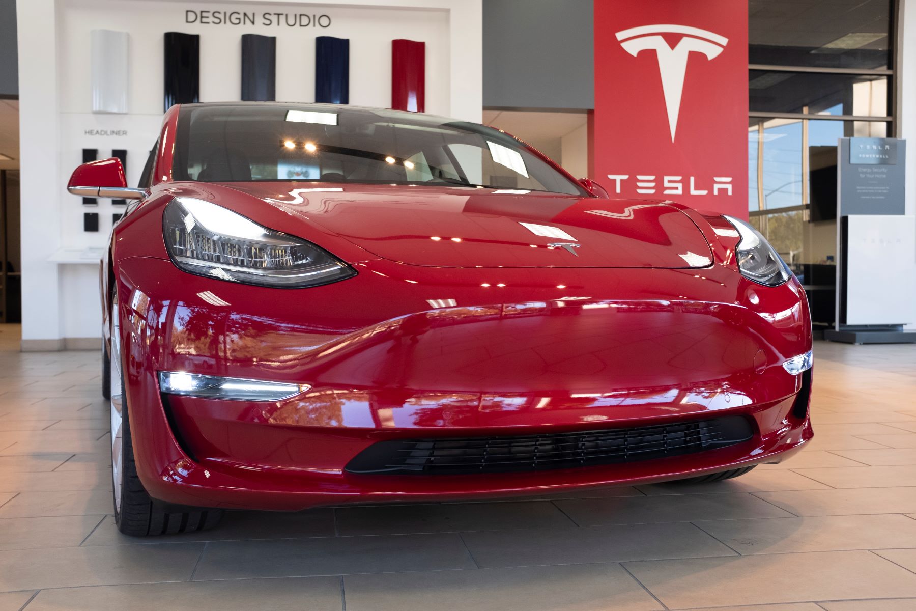 A Tesla Model S electric luxury sedan model on display at a Tesla store in Palo Alto, California