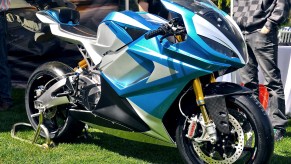 A blue-and-silver Lightning LS-18 electric motorcycle at the Quail Motorcycle Gathering
