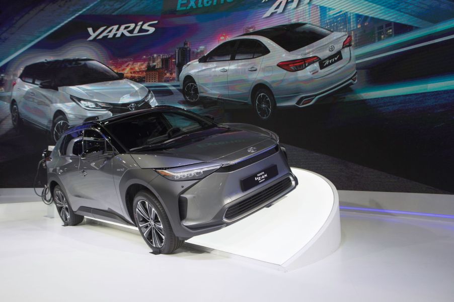 A gray Toyota BZ4X on a platform.