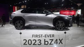 A silver 2023 Toyota bZ4X parked indoors.