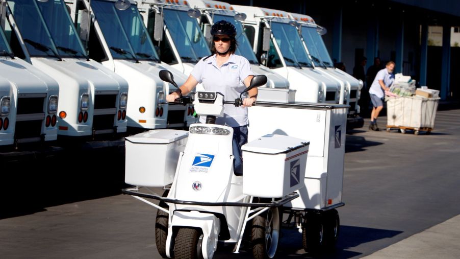 A USPS T-3 Motion electric-powered three-wheeler bike being tested by Dana Grasman for range and performance