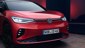 A red Volkswagen ID.4 GTX electric SUV.