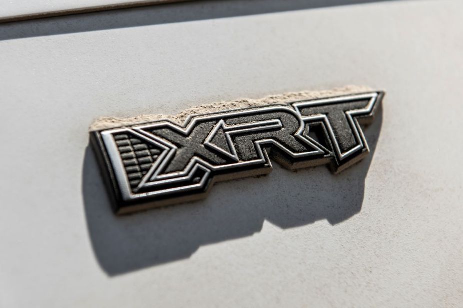XRT badge on white 2023 Hyundai Palisade, highlighting its price information