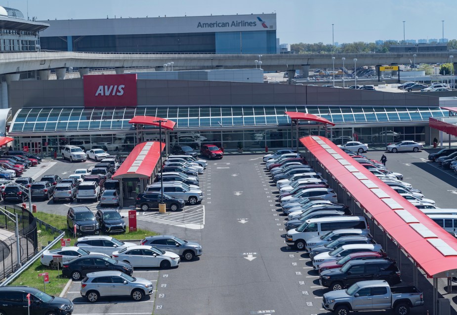 AVIS parking lot is full due to no customers during the COVID-19 pandemic at JFK airport. 