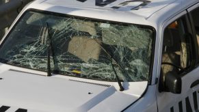 A shattered windshield of a U.N. vehicle after a roadside blast in Rmeileh