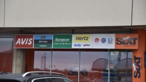 Rental car signs featured at Terminal 1 of the Cologne Bonn Airport