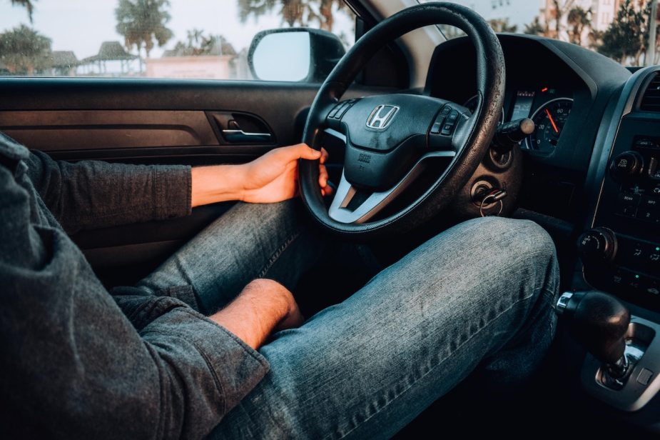 A driver casually drives his Honda CR-V