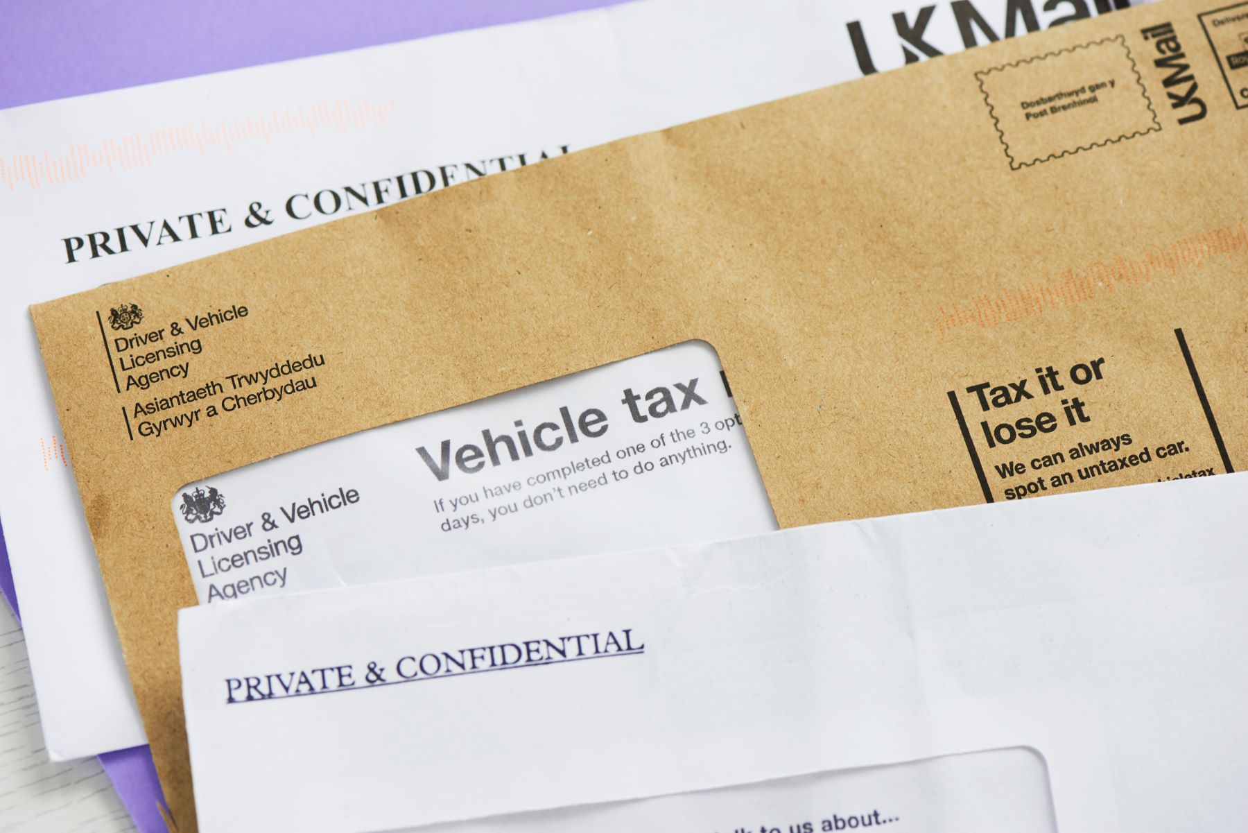 Vehicle title and tax documents sent by mail