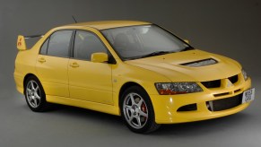 the 2003 mitsubishi lancer evolution viii, an all-wheel drive performance car that gets you to 60 mph in a blazing time