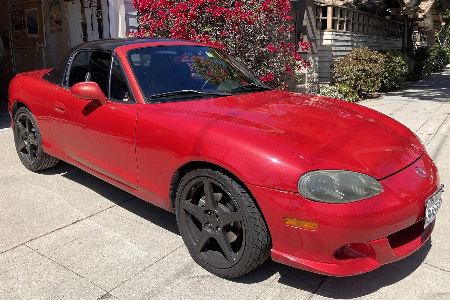 2004 Red Mazdaspeed Miata Convertible Roadster parked in driveway in San Diego, California