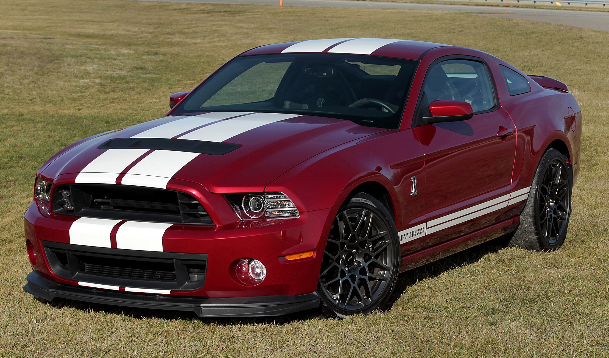 The 2013 Ford Mustang GT500 is a contender to take on the 2015 Dodge Hellcat for supercharged muscle car supremacy.
