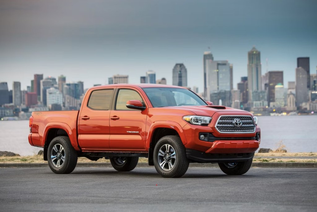 The 2017 Toyota Tacoma in front of a city view