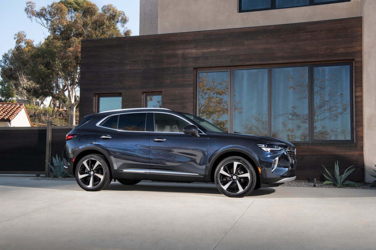2022 Buick Envision in front of a mid-century modern house