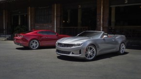 2022 Chevrolet Camaro LS and LT sitting next to each other.