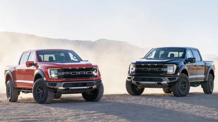 2022 Ford F-150 Raptor models in the sand. Why doesn't Consumer Reports recommend the full-size truck?