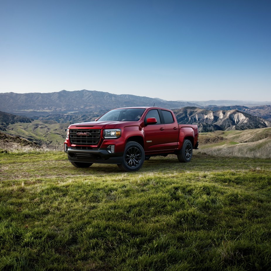 A red 2022 GMC Canyon on greener pastures