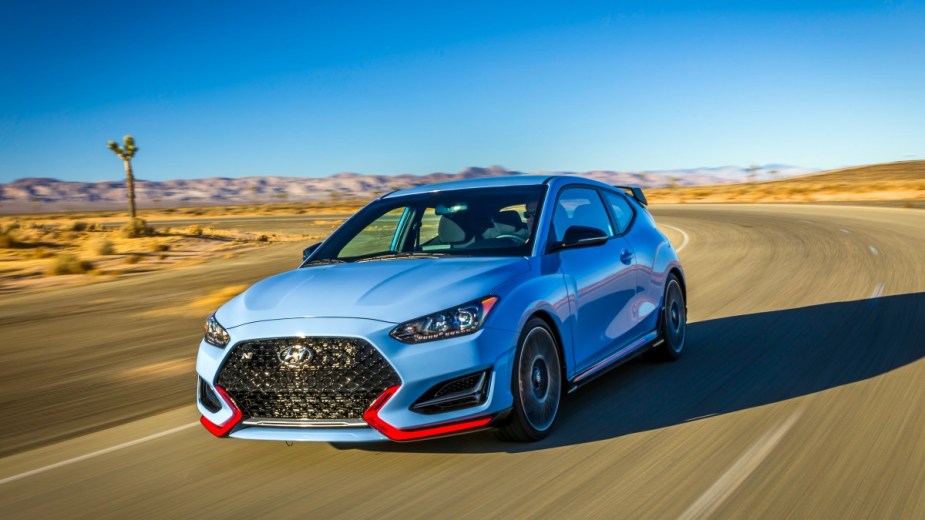 a blue hyundai veloster n with red trim pieces, this front wheel drive is among the hottest hatchbacks