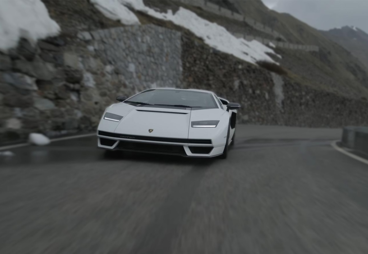 2022 Lamborghini Countach Driving Stelvio Pass in Northern Italy with snow in the background