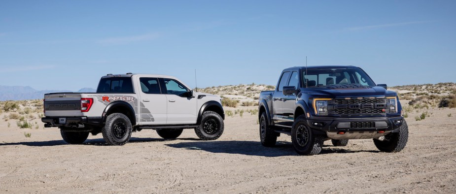 Promo photo of a gray and a black Raptor R all-time 4WD pickup truck.