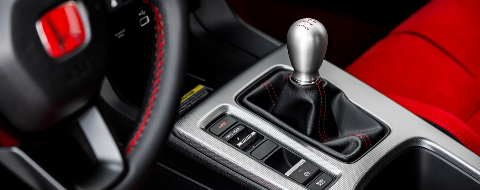 The aluminum shift knob in the new 2023 Honda Civic Type R is a a fitting centerpiece for a hot hatch.