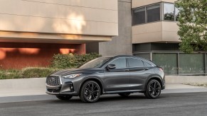 2023 Infiniti QX55 parked by a building