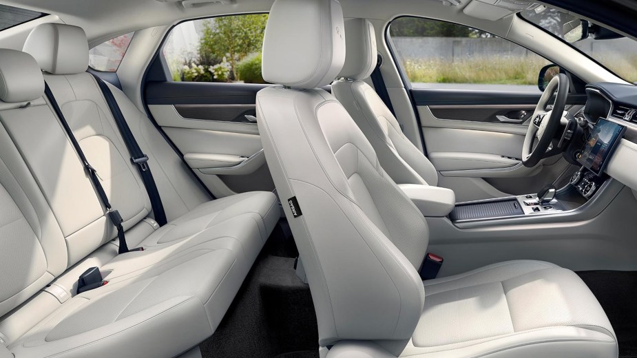 The white-leather seats and dashboard of a 2023 Jaguar XF