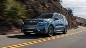 2023 blue carnival on a mountain road