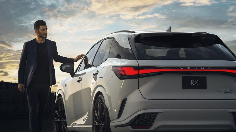 2023 Lexus RX in white with a male model