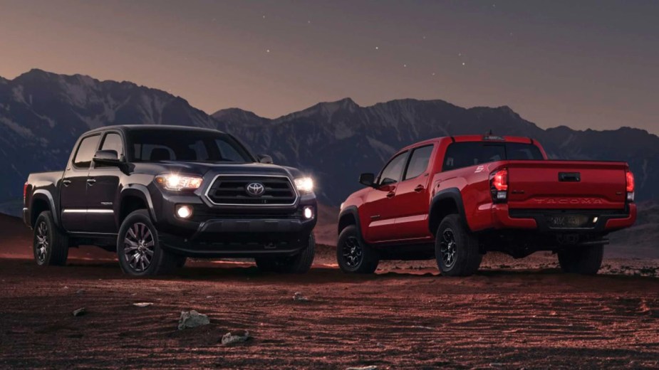 Two 2023 Toyota Tacoma Trucks posed outdoors